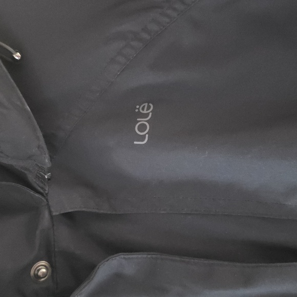 𝅺Lolë Softshell Rain Jacket With Hood - Picture 3 of 12